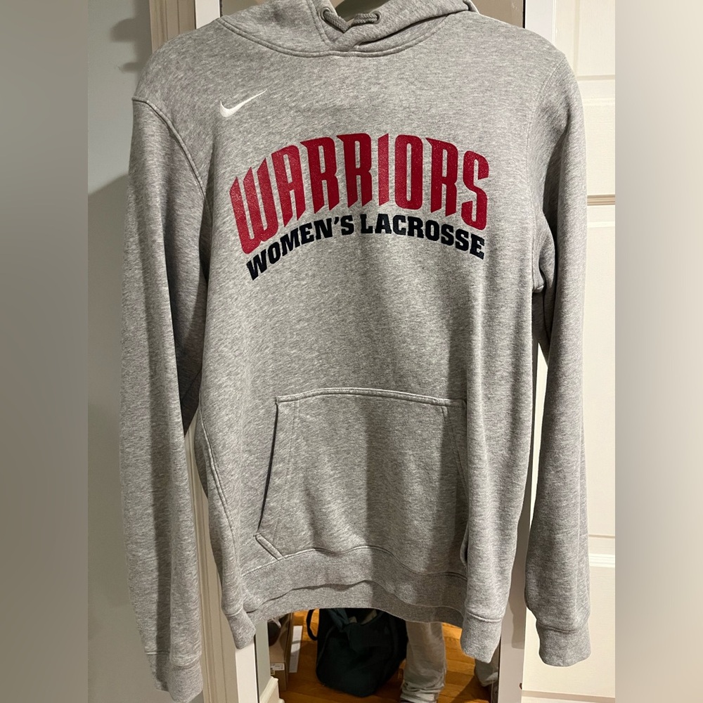 New without tags. Nike Men’s size small. Women’s Lacrosse Warriors sweatshirt